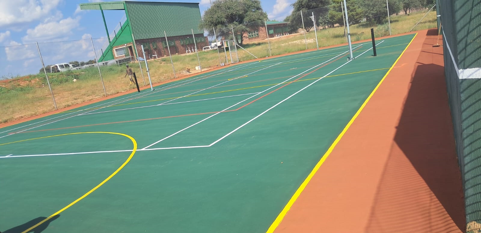 Sports Legend multi-sport court combining basketball netball and tennis
